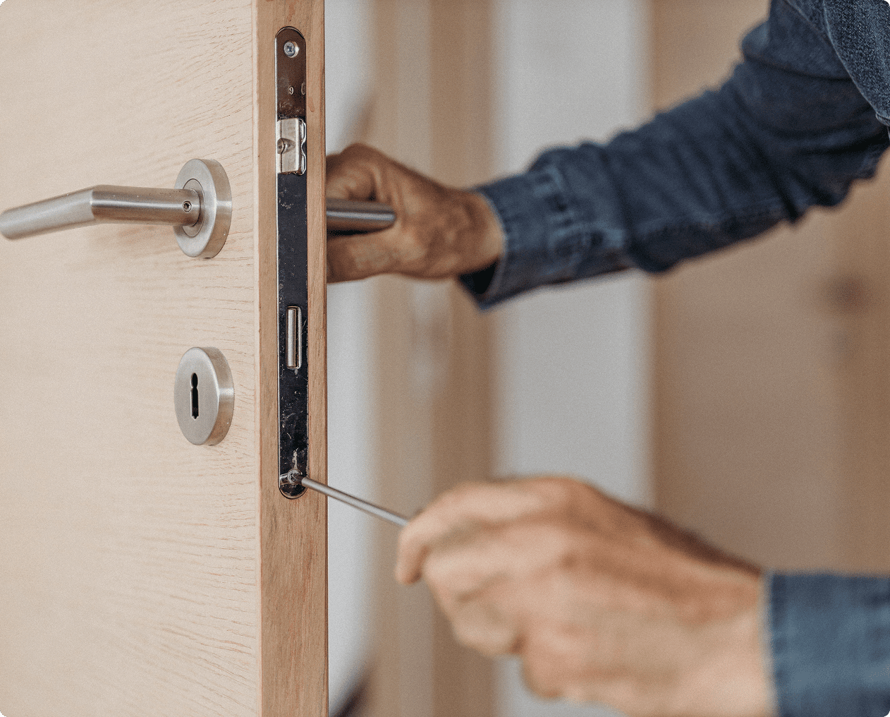 Fixing door lock with screwdriver