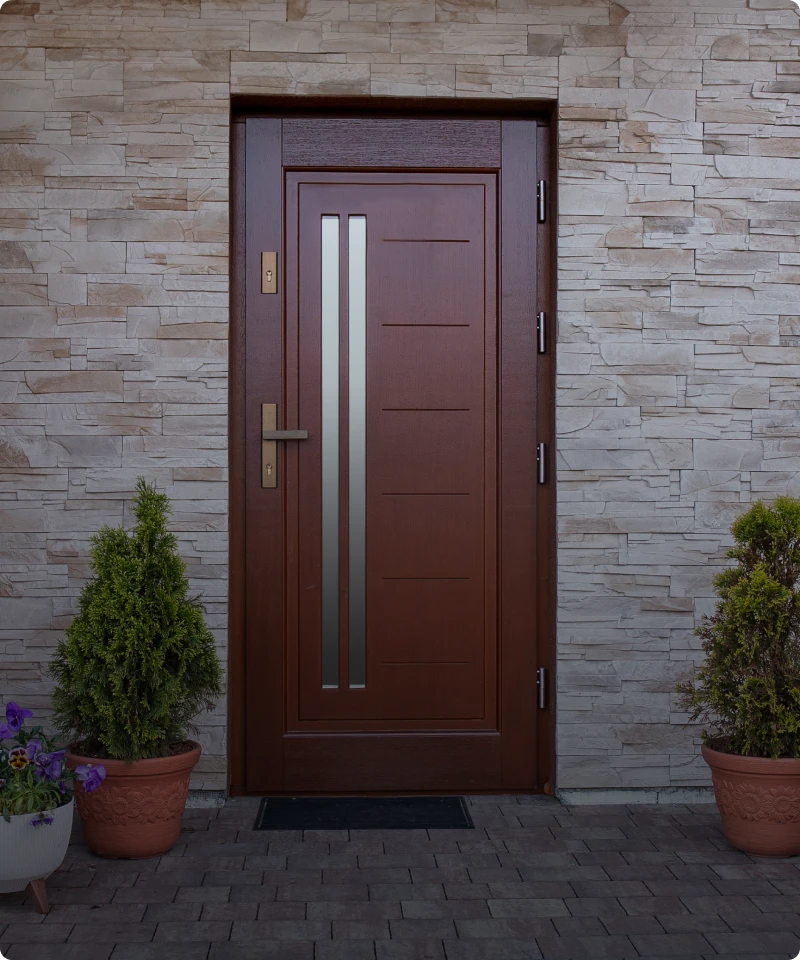 Entrance with potted plants and door